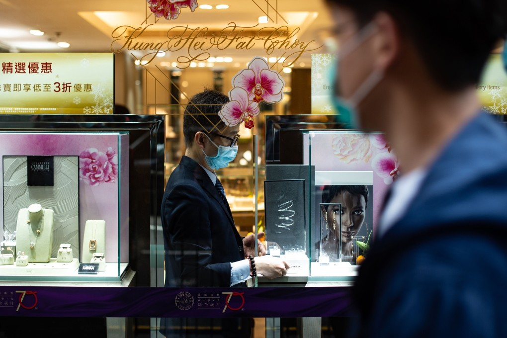 The face masks are out in Hong Kong amid a coronavirus outbreak in China. The illness could determine how the Year of the Rat starts for the city’s stock market, analysts say. Photo: AFP