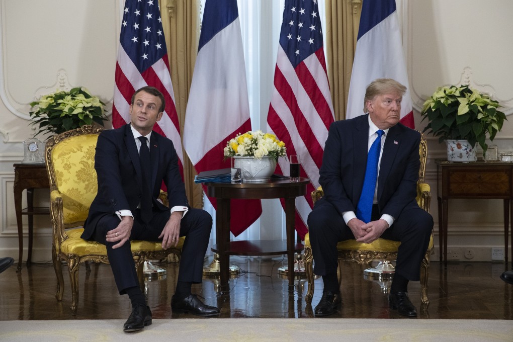 French President Emmanuel Macron and US President Donald Trump meet at Winfield House in London on December 3. They have agreed a truce in a spat about taxing Big Tech. Photo: AP