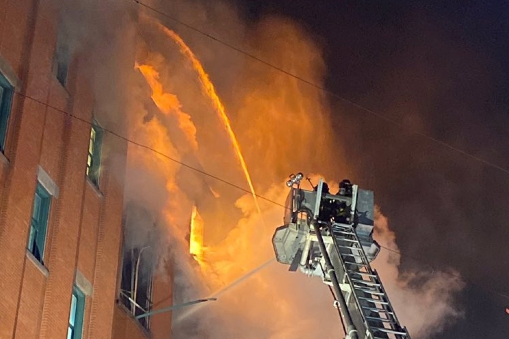 Firefighters work to extinguish fire from a building in Manhattan's Chinatown district on January 23, 2020. Photo: NYC Fire Department/Twitter