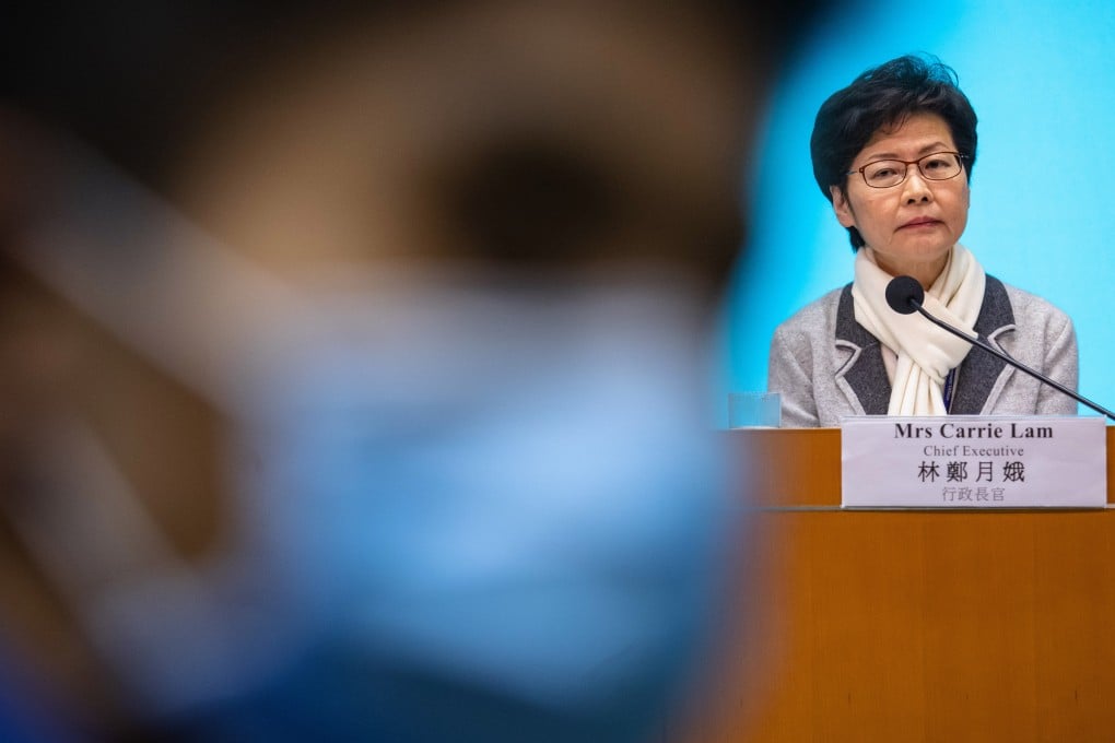 Carrie Lam would have been far more convincing to the world and Hong Kong if she had rushed back and taken charge. That might have justified her staying on during a potentially deadly health crisis. Photo: Bloomberg