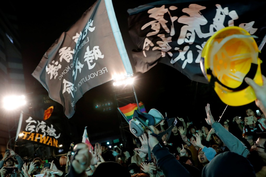 Hong Kong's anti-government protesters attend a rally held by incumbent Taiwan President Tsai Ing-wen after her election victory on January 11. Photo: Reuters