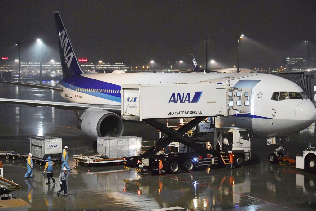 A charter plane bound for Wuhan, China, to evacuate Japanese nationals from the Chinese city, is seen at Haneda airport in Tokyo. Photo: Kyodo