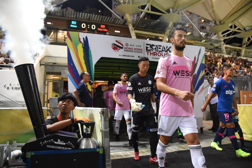 Happy Valley and Kitchee players enter the Mong Kok Stadium pitch ahead of the 2019-20 Hong Kong Premier League season opener. Photo: Facebook/Happy Valley