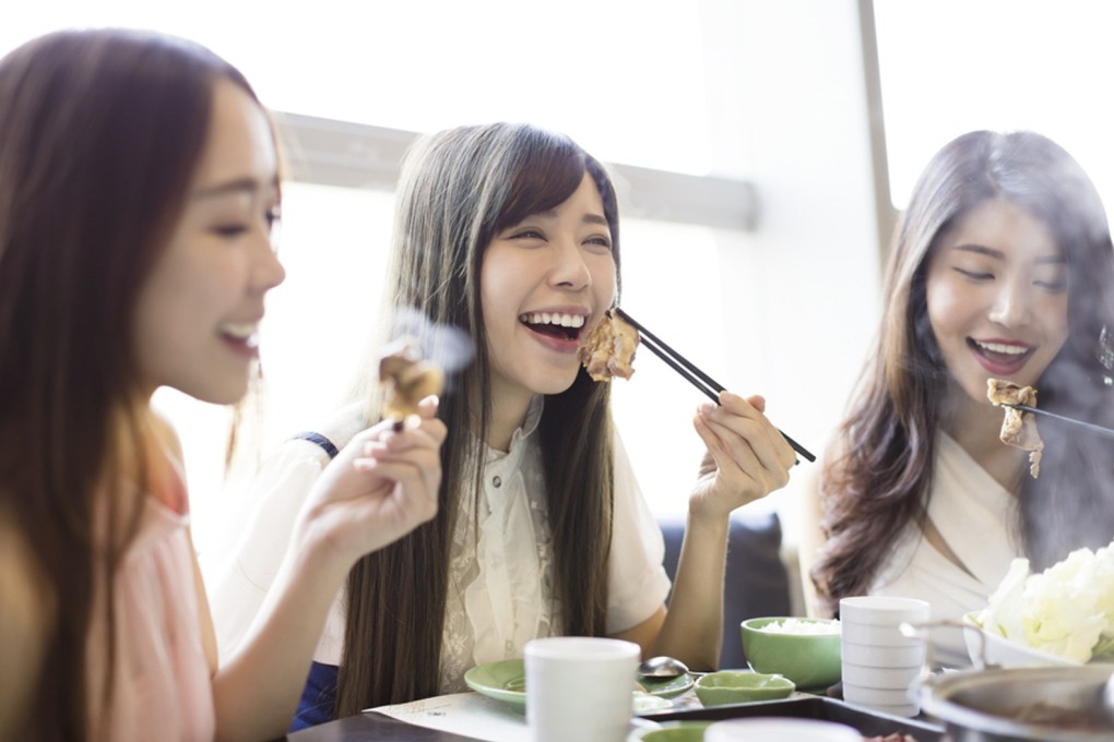 Left-handed people struggle with things such as smudging their writing and fighting for chopstick space – but why are people born left-handed? Photo: Shutterstock