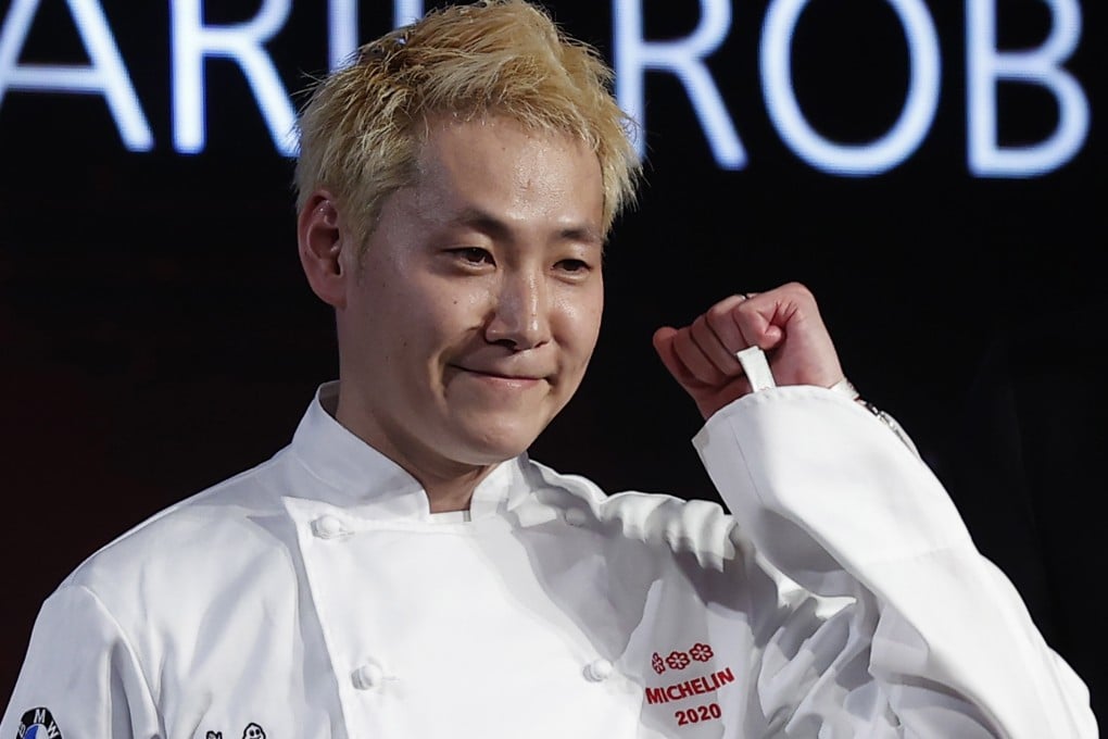 Japanese chef Kei Kobayashi celebrates winning his third Michelin star at the ceremony in Paris on Monday. Photo: EPA-EFE