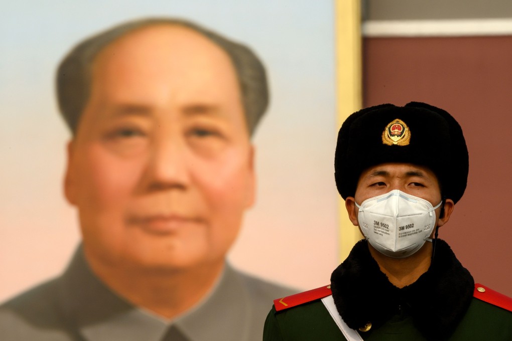 A paramilitary police officer wearing a protective face mask stand on guard at Tiananmen in Beijing on January 28. China’s initial mishandling of the coronavirus outbreak means that thousands have been infected, and over a hundred have died. Photo: AFP