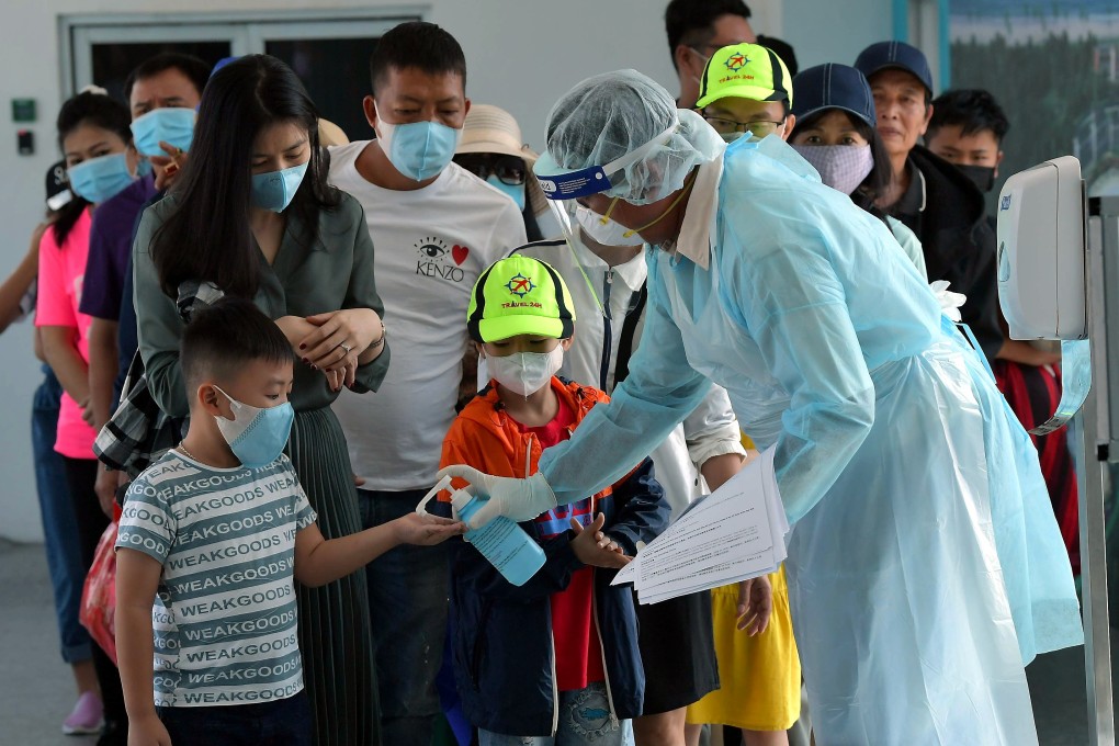Malaysian authorities help tourists prevent the spread of the coronavirus. Photo: dpa