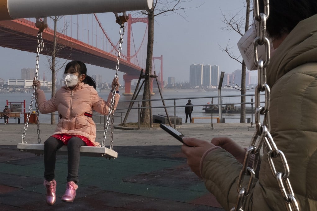 A child plays on a swing in Wuhan, the epicentre of the coronavirus epidemic. Photo: AP