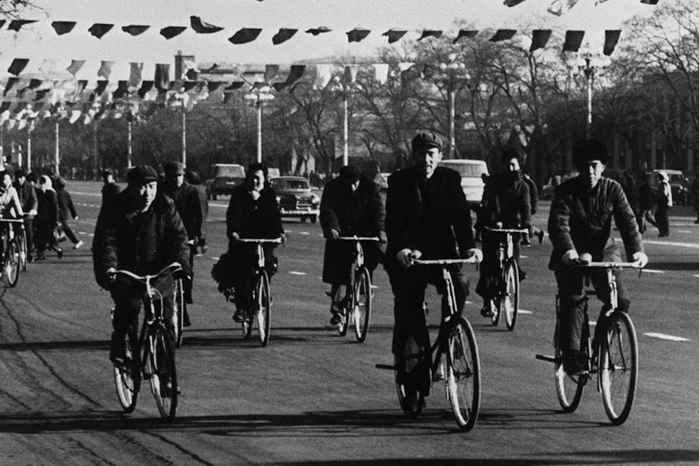 Bicyclists on a street in China on March 20, 1980. The country’s population surpassed one billion the previous month. Photo: AFP