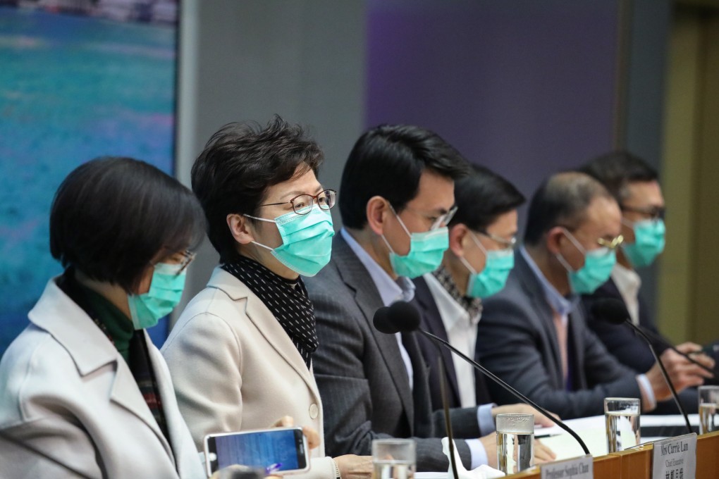 Hong Kong Chief Executive Carrie Lam (second left) with her top government officials during a press conference at the government headquarters in Admiralty on January 28. Photo: Nora Tam