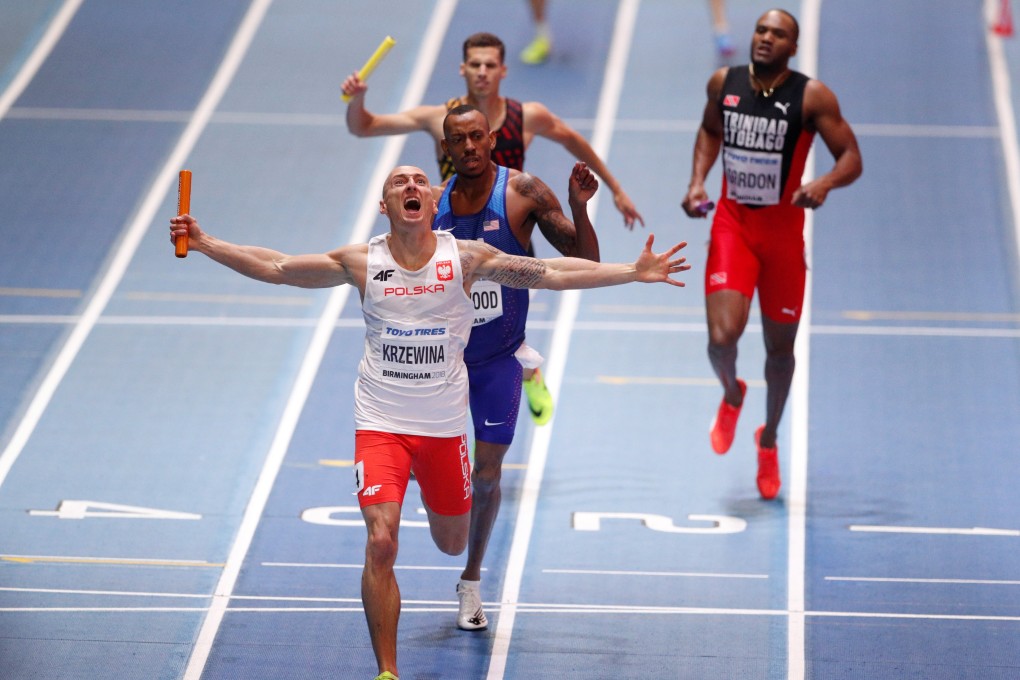 Jakub Krzewina of Poland celebrates winning the men's 4x400 metres relay at the IAAF World Indoor Championships in 2018. Photo: Reuters