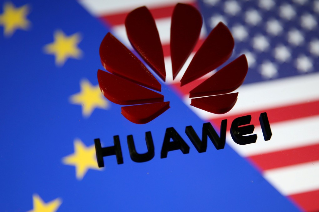 A 3D printed Huawei logo is placed on glass above displayed EU and US flags in this illustration taken January 29, 2019. Photo: Reuters