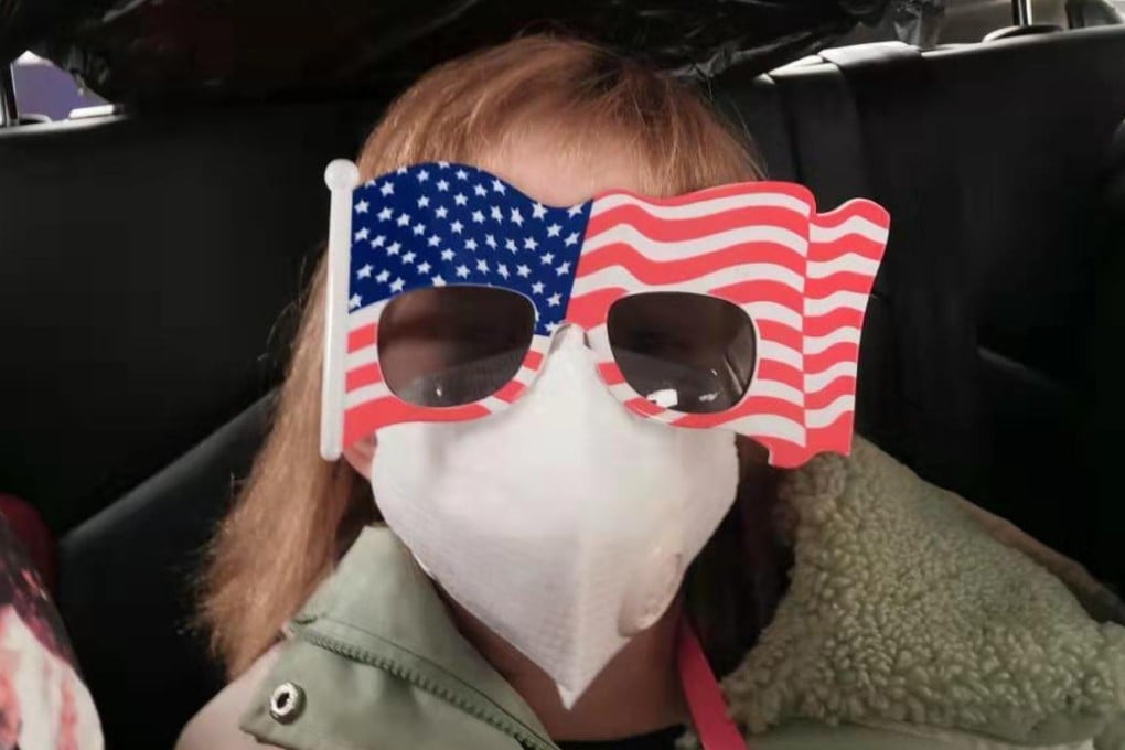 Hermoine Dickey, aged 8, on her way to Wuhan Tiange International Airport for a charter flight to California on Tuesday. The US government transported 195 diplomats, family members and other Americans out of Wuhan. Photo: Priscilla Dickey via AP