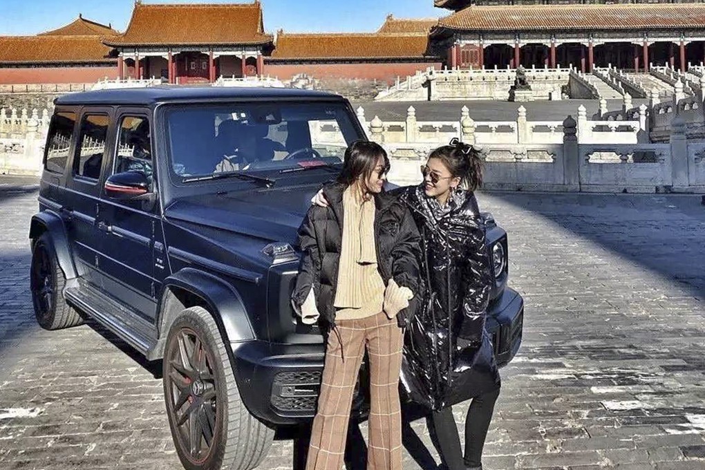 Weibo photos showing two women who were able to park a luxury Mercedes-Benz G-Wagen SUV inside Beijing's Forbidden City, sparking outrage.