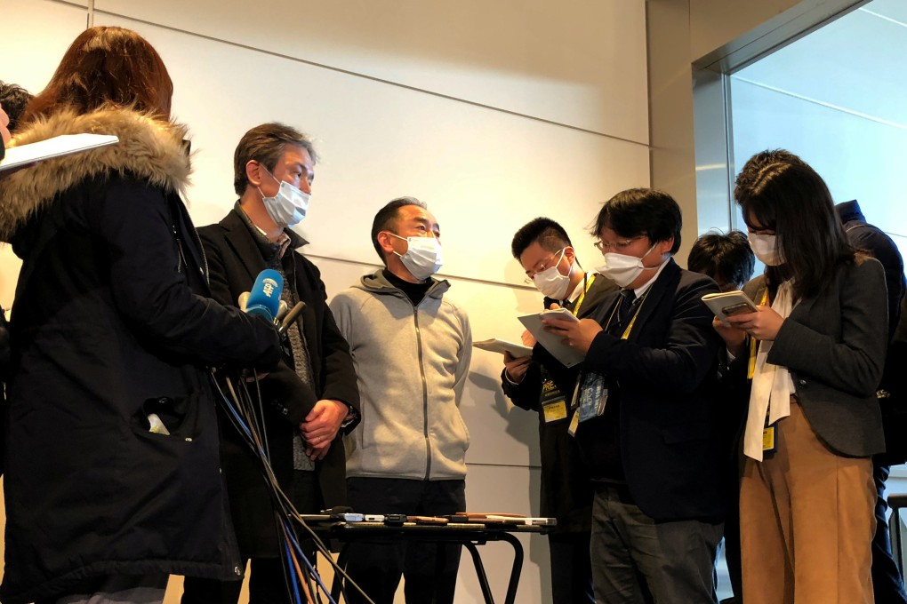 Japanese passengers after being evacuated from Wuhan. Photo: Reuters