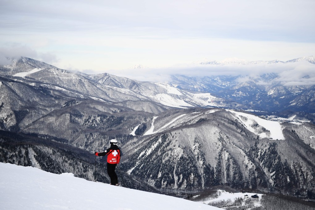A member of a safety patrol skis on a slope in western Japan. Photo: AFP