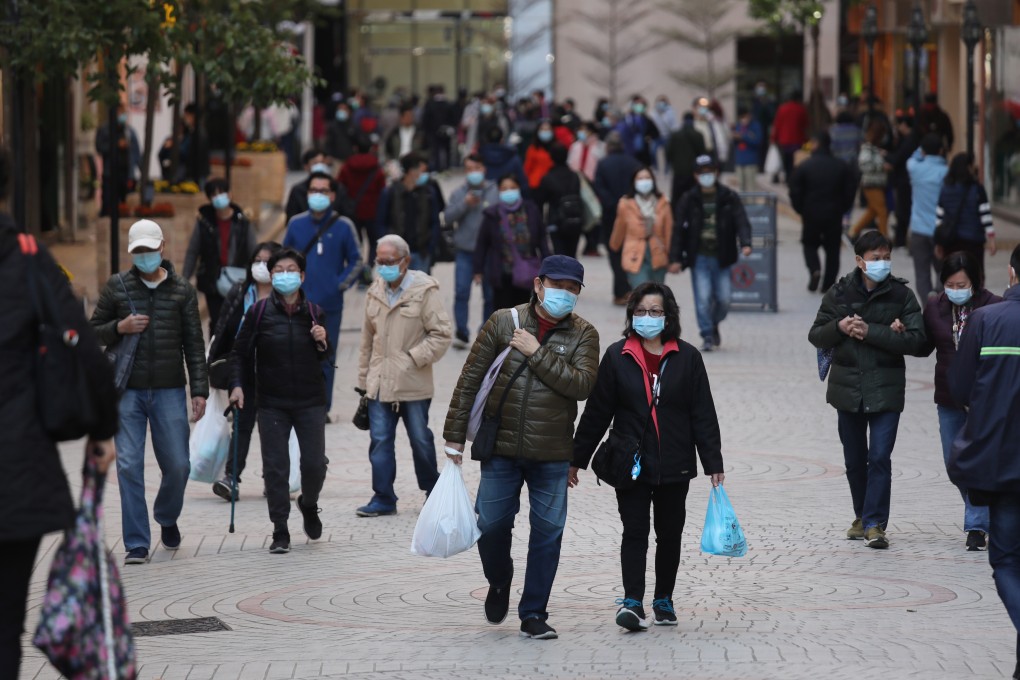 Residents wear masks in Kowloon Bay, Hong Kong, on Thursday, amid fears of the coronavirus spreading. Photo: Xiaomei Chen