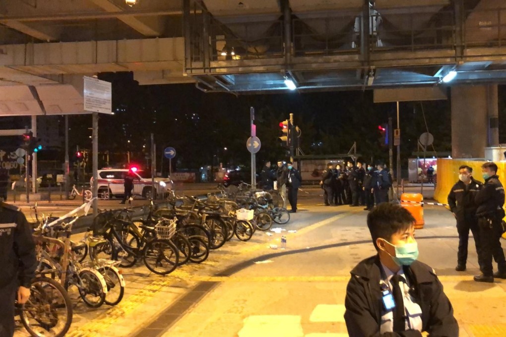 Police are searching for about 10 masked men who attacked six people outside Yuen Long MTR station. Photo: Handout