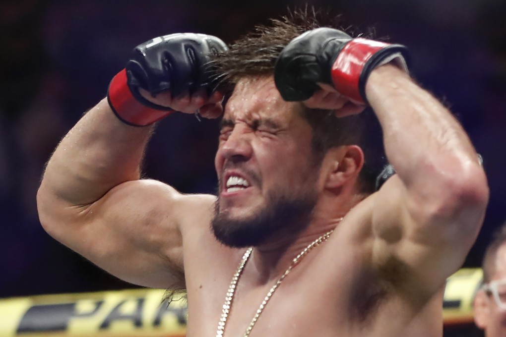 Henry Cejudo becomes a UFC double champion after defeating Marlon Moraes during at UFC 238 in 2019. Photo: AP