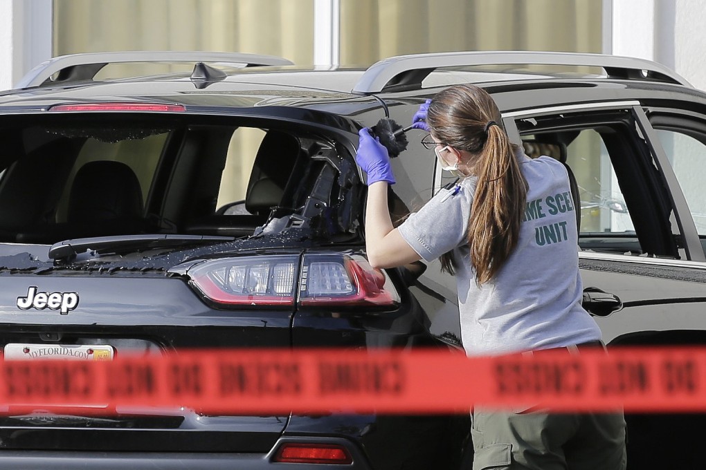 A forensic technician works on the vehicle authorities say breached security at US President Donald Trump's Mar-a-Lago resort on Friday. Photo: AP