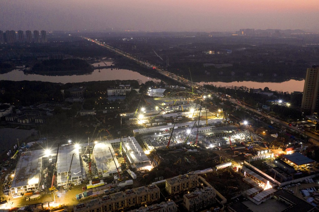 Construction of the Huoshenshan temporary hospital in Wuhan is under way and it is expected to be ready next week. Photo: Xinhua via AP