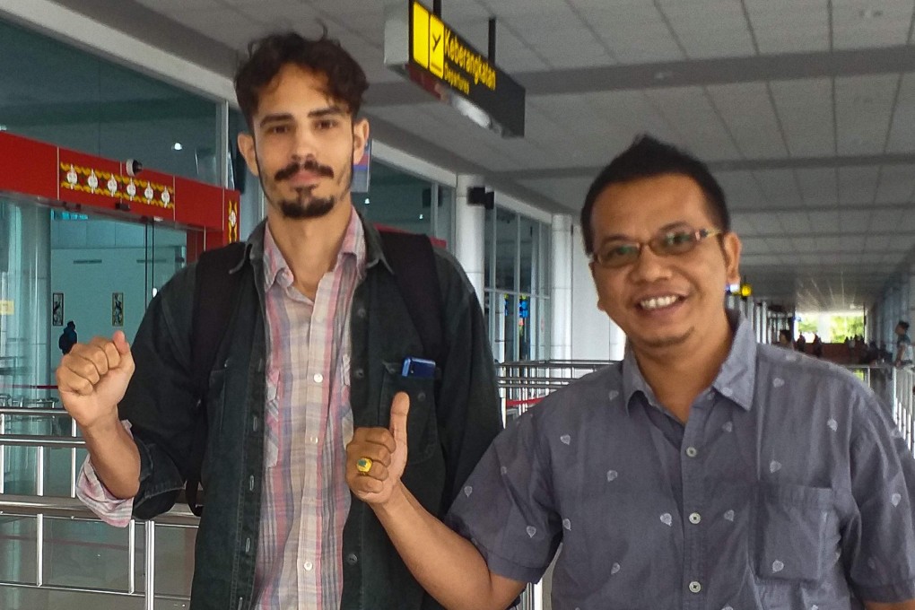 US journalist Philip Jacobson (L). Photo: AFP