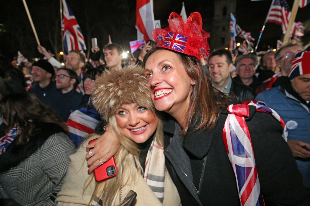 Brexit supporters take part in a celebration rally at the Parliament Square in London as Britain officially leaves the EU on Friday. Photo: PA via dpa