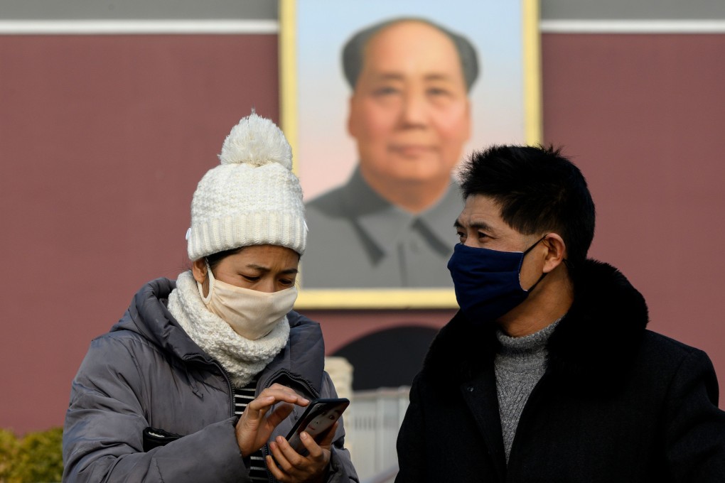 People wearing protective face masks to help stop the spread of a deadly SARS-like virus which originated in the central city of Wuhan, January, 2020. Photo: AFP