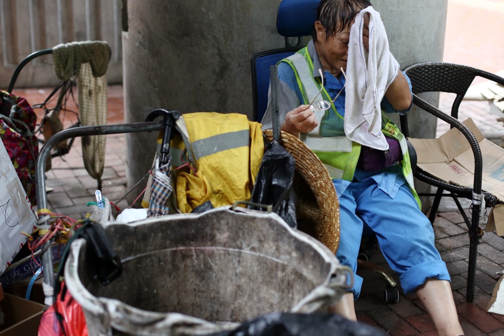 Hong Kong’s street cleaners are at the front line of the city’s fight against the outbreak. Photo: Nora Tam