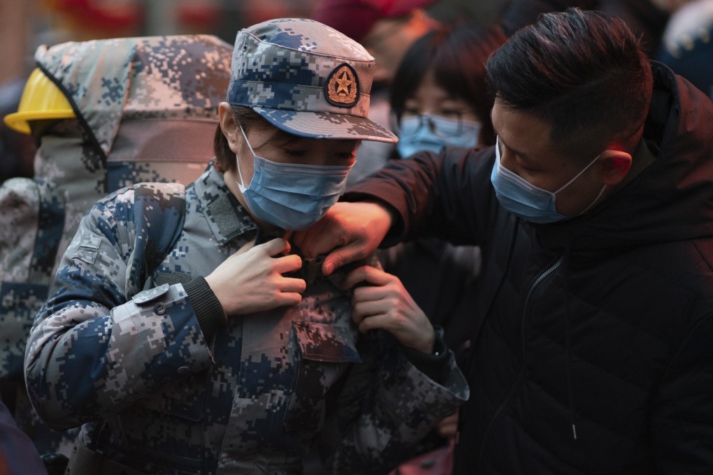 The Chinese military is sending 1,400 medical staff, some with experience from the previous Sars and Ebola outbreaks, to treat coronavirus patients in Wuhan. Photo: AP