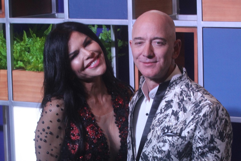 Amazon CEO Jeff Bezos, right along with American news anchor Lauren Sanchez poses for photographs during a blue carpet event organised by Amazon Prime Video in Mumbai, India on January 16, 2020. (Imtiyaz Shaikh /Anadolu Agency via Getty Images/TNS)
