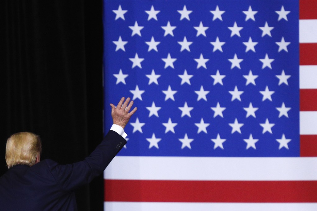 US President Donald Trump waves to the audience while departing from the podium following his remarks at a campaign rally at Drake University in Des Moines, Iowa, on January 30. Photo: Getty Images/AFP