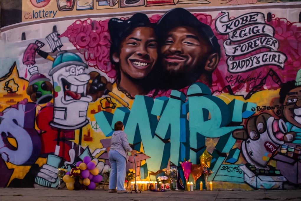 A mural shows Kobe Bryant and his daughter Gianna, at a memorial in Los Angeles on January 27. Bryant and Gianna were killed with seven others in a helicopter crash on January 26. Photo: AFP