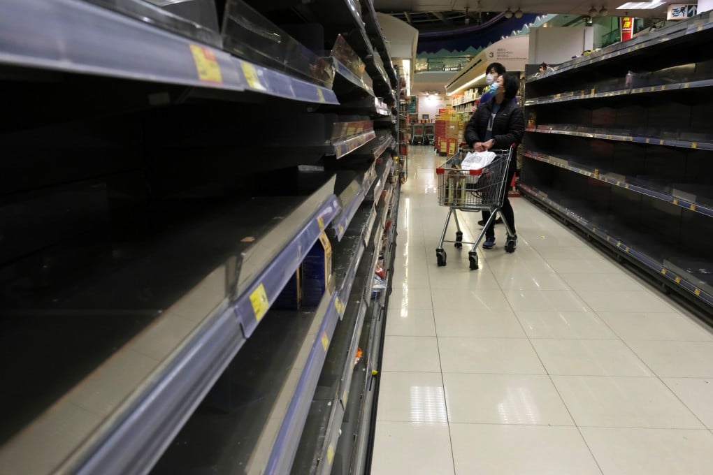 Empty instant noodle shelves at a supermarket in Hong Kong on January 30. Photo: Reuters