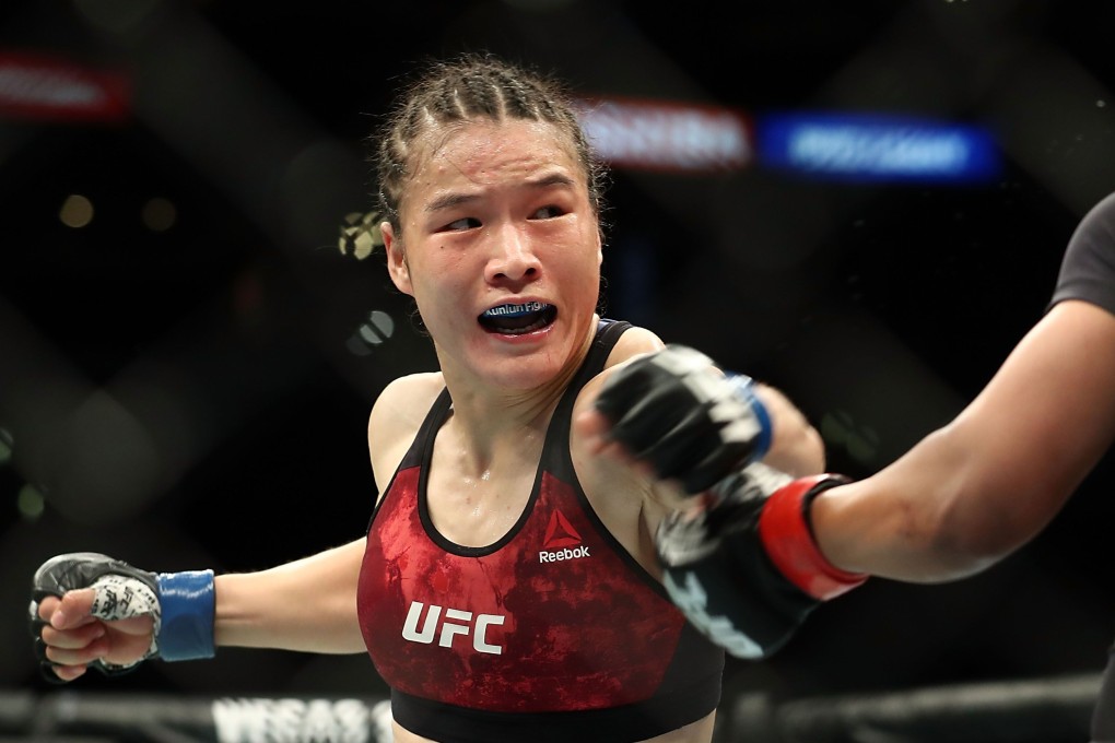 UFC strawweight champion Weili Zhang punches Danielle Taylor at UFC 227 in 2018. Photo: AFP