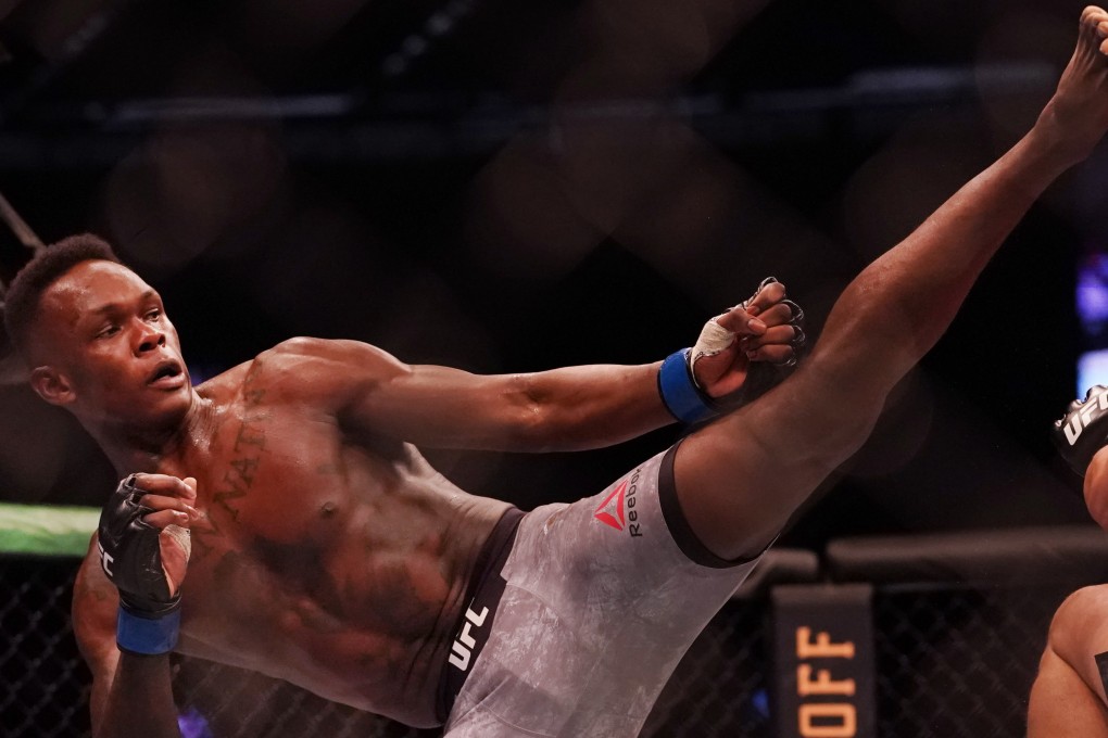 Israel Adesanya during his successful middleweight title defence against Robert Whittaker at UFC 243 in Australia last year. Photo: EPA