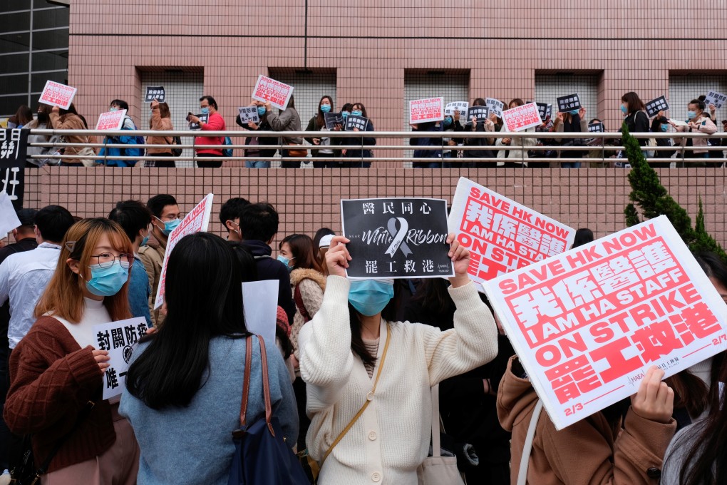 Medical workers rally outside the Hospital Authority on February 4 to demand that the Hong Kong government close the city’s border with the Chinese mainland to contain the spread of the deadly new coronavirus. Photo: Reuters