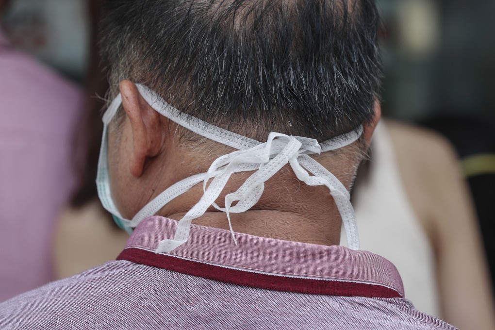 A man wears a protective mask in Singapore. Photo: EPA