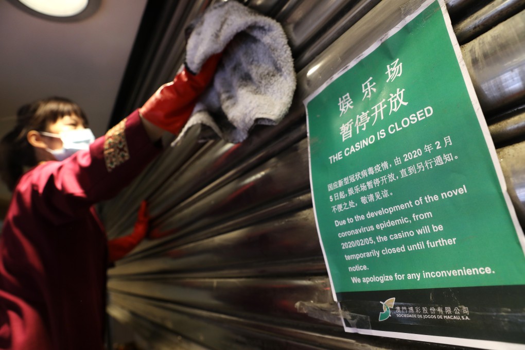 A closure notice at the Grand Lisboa casino in Macau issued by the Macau government. All casinos in the city will be closed for two weeks from Wednesday to help contain the coronavirus outbreak. Photo: Winson Wong