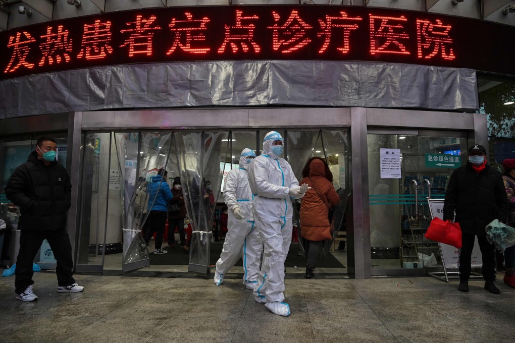 Medical staff members in protective suits are seen at the Wuhan Red Cross Hospital, in the capital city of Hubei province, on January 25. The present crisis should be seen as a call to arms for China’s tech industry. Photo: AFP