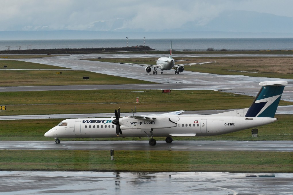 WestJet planes are seen at Vancouver International Airport in Canada. Photo: Reuters