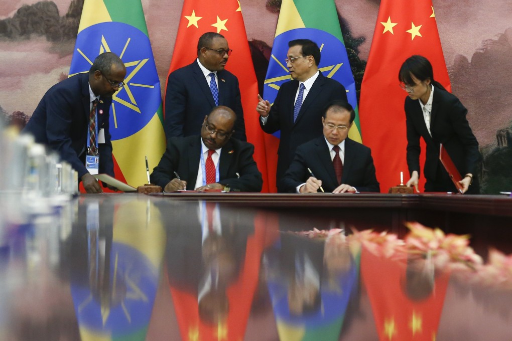 Chinese Premier Li Keqiang, third from right, and Ethiopia's then-Prime Minister Hailemariam Desalegn, second from left, attend a signing ceremony at the Great Hall of the People in Beijing in 2017. Photo: AP