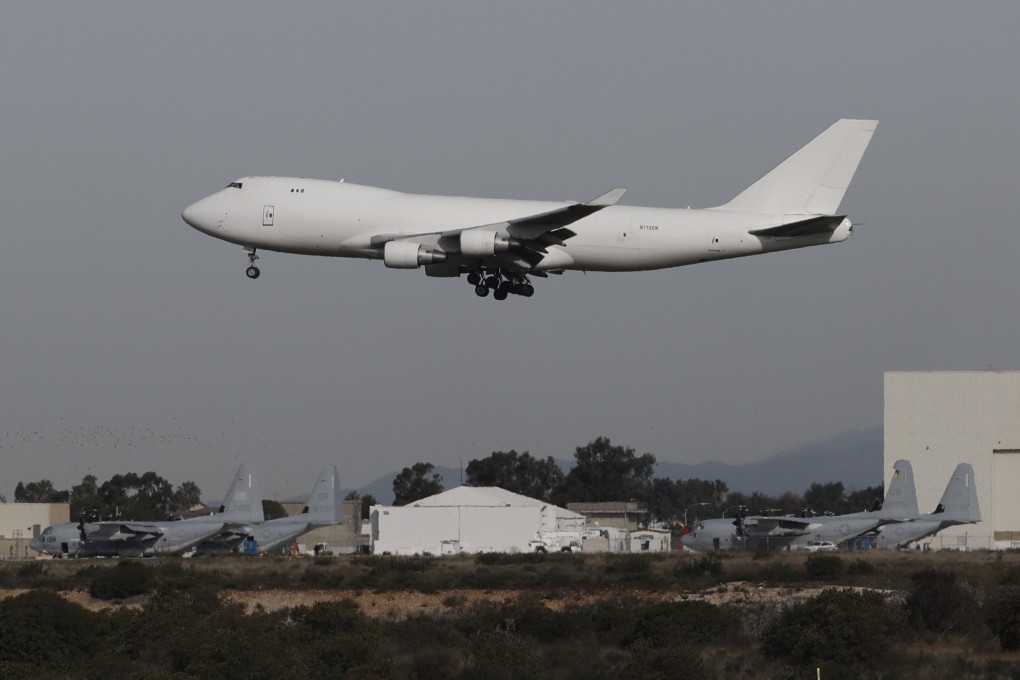 A plane carrying evacuees from Wuhan lands at Marine Corps Air Station Miramar in southern California on Wednesday. Photo: AP