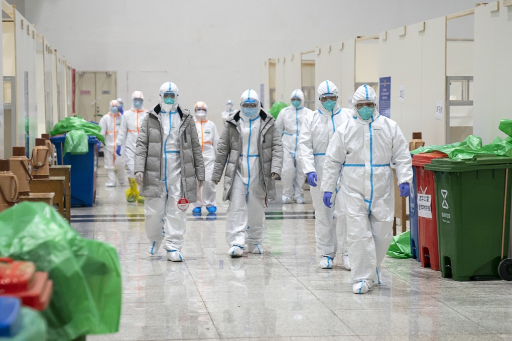 Medical staff at work in a makeshift hospital that was converted from an exhibition centre, in Wuhan, central China. Photo: Xinhua