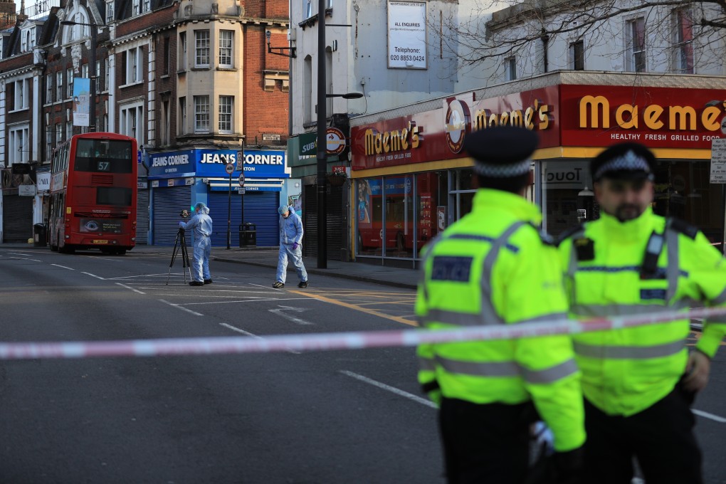 Forensic officers investigate at the scene on February 2 following the stabbing attack on Streatham High Road in London. Photo: dpa