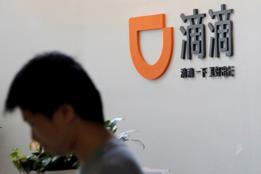 The logo of Chinese ride-hailing giant Didi Chuxing is seen at its headquarters in Beijing. Photo: Reuters