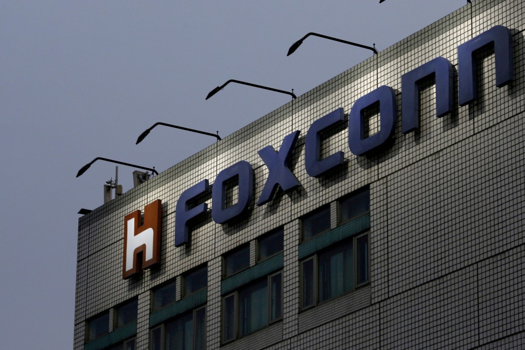 The logo of Foxconn Technology Group, the trading name of Hon Hai Precision Industry, is seen on top of the company's headquarters in New Taipei City, Taiwan. Photo: Reuters