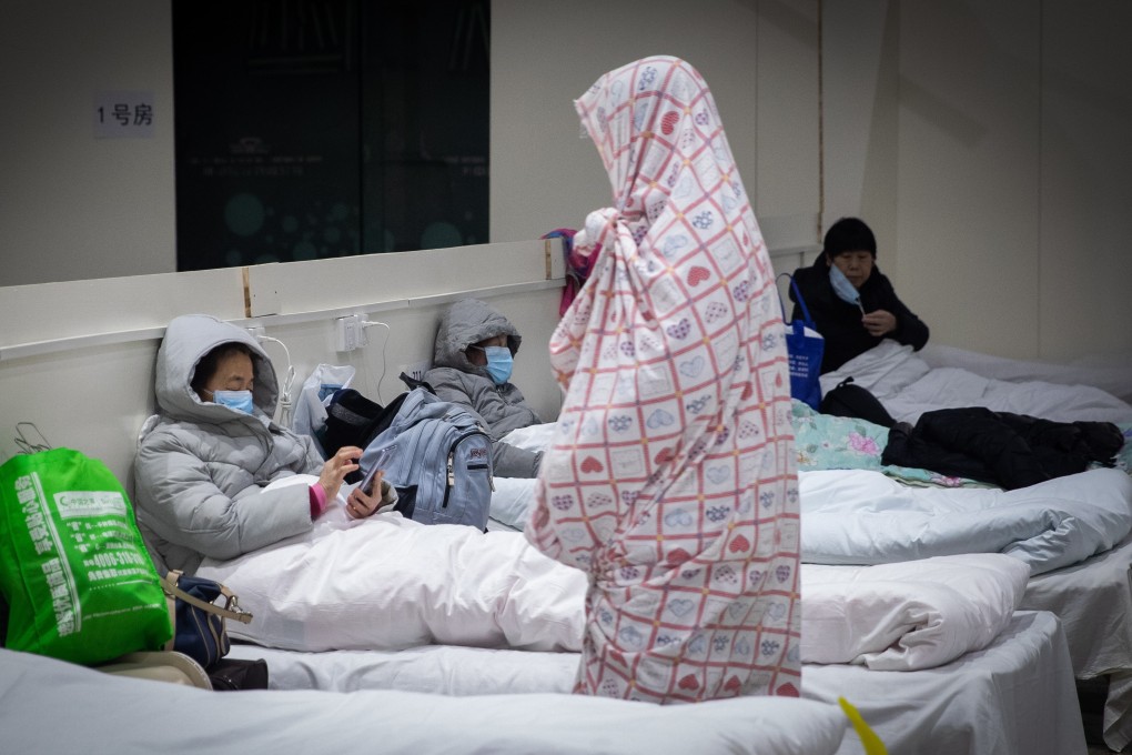 Patients rest at a makeshift hospital in Wuhan on Wednesday. More than 10,000 people have contracted the virus in the city so far. Photo: EPA-EFE