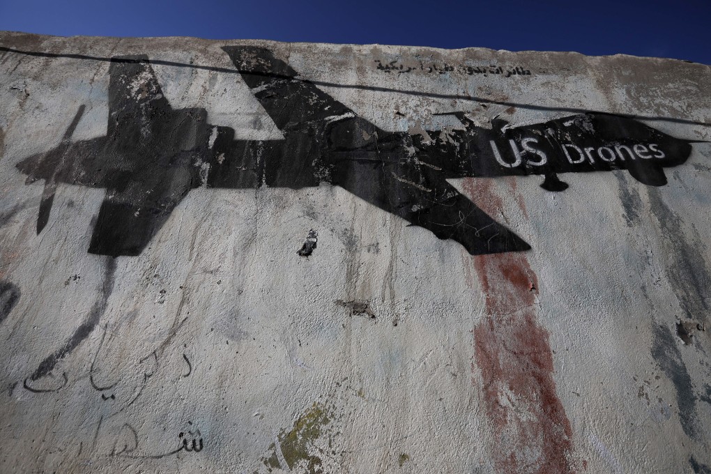 A wall with a graffiti depicting a US drone, after a US drone raid killed an al-Qaeda leader in Yemen. Photo: EPA-EFE
