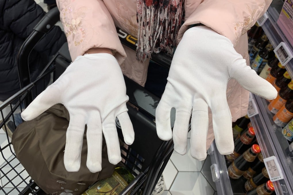 Hands up those worried about the coronavirus: Hong Kong residents scramble for gloves to guard against infection amid outbreak | South China Morning Post